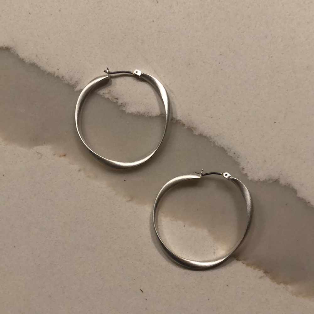 Hoop earrings. Light. White silver.
